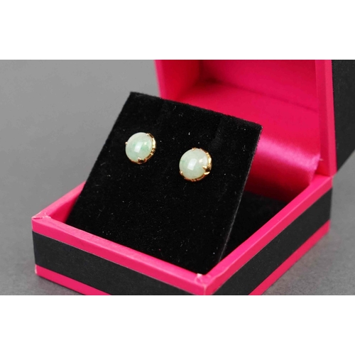 290 - Pair of yellow gold opal stud earrings