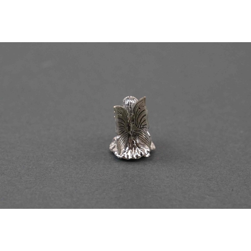 292 - Silver pincushion in the form of a seated fairy, stamped sterling