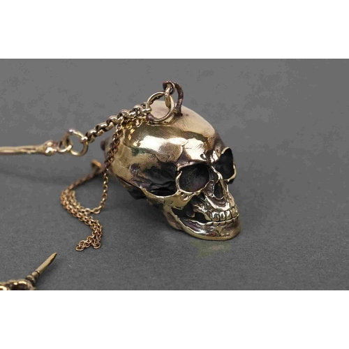 308 - Brass Albert style watch chain, with skull adornment