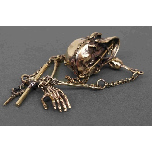 308 - Brass Albert style watch chain, with skull adornment