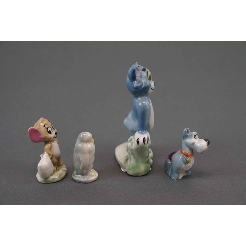 309 - A collection of four wade figures to include Tom & Jerry.