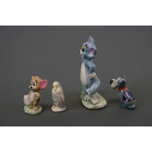 309 - A collection of four wade figures to include Tom & Jerry.