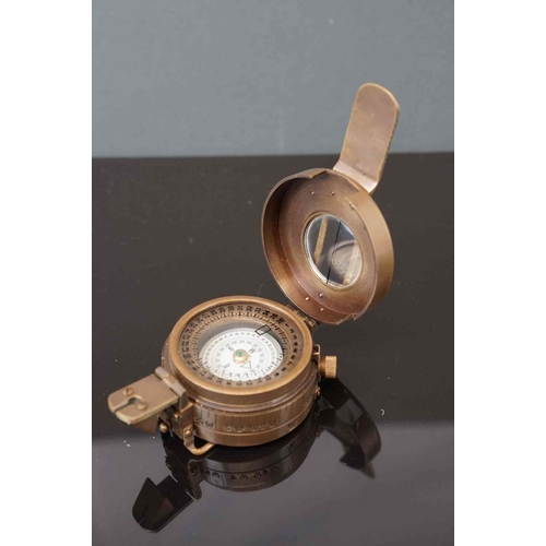 316 - Brass cased compass and dial