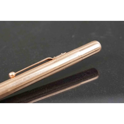 317 - A fully hallmarked 9ct gold propelling pencil with London assay mark.