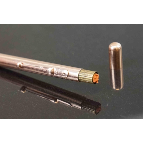 317 - A fully hallmarked 9ct gold propelling pencil with London assay mark.