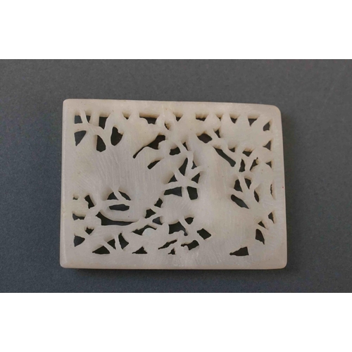 321 - A pierced carved jade decorative panel with two birds.