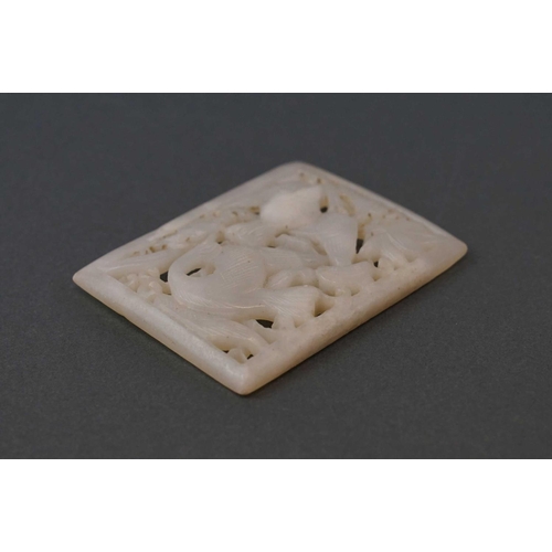 321 - A pierced carved jade decorative panel with two birds.