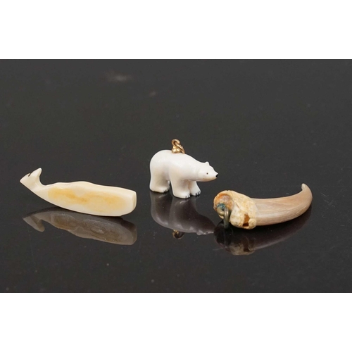 330 - Three Inuit pendants to include a whale and a polar bear.