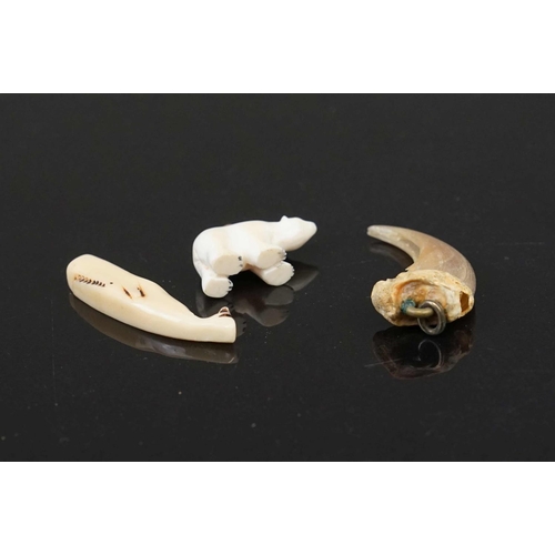 330 - Three Inuit pendants to include a whale and a polar bear.