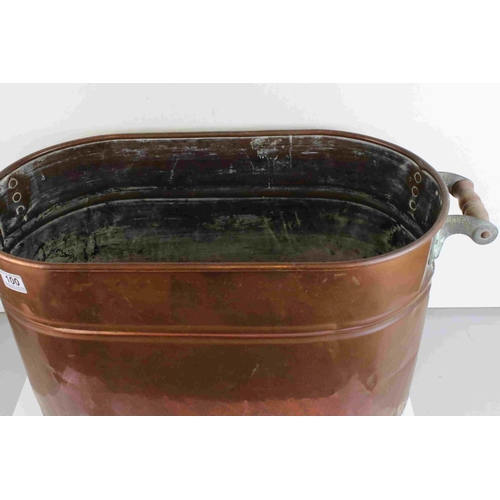 100 - A large copper two handled French fish type kettle pan.