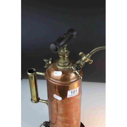 101 - Antique Copper Grease Gun converted to a lamp with adjustable light.