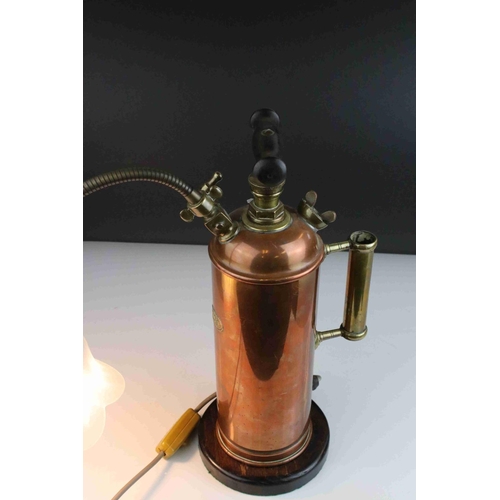 101 - Antique Copper Grease Gun converted to a lamp with adjustable light.