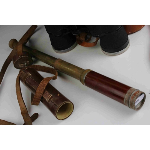 102 - Cased set of Binoculars together with a small vintage leather cased field telescope.