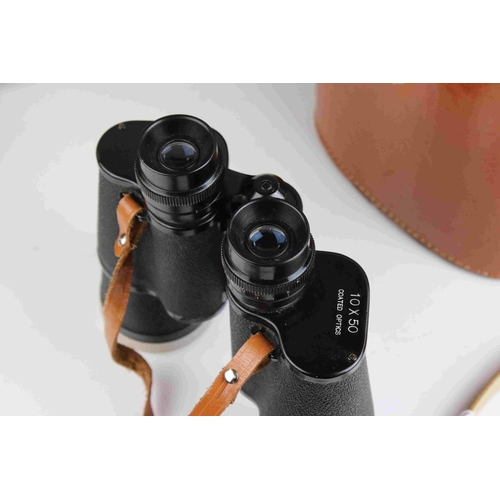 102 - Cased set of Binoculars together with a small vintage leather cased field telescope.