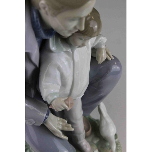 12 - Boxed Lladro figure ' A Day With Dad 01006793 ', 28cm in height