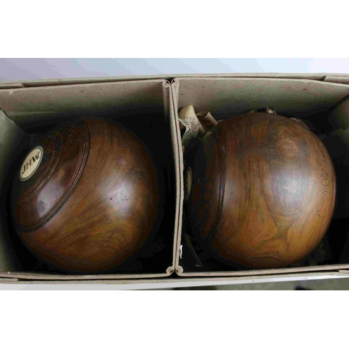 124 - Two Sets of Two Early 20th century Jaques of London Wooden Standard Bowls, contained in the original... 