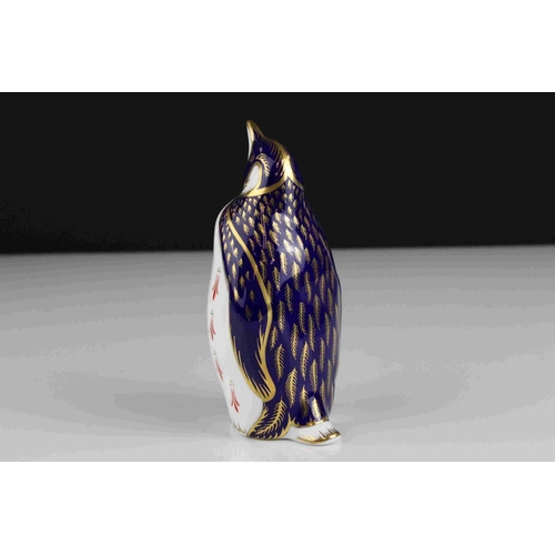 14 - Royal Crown Derby Penguin Paperweight with gold stopper.