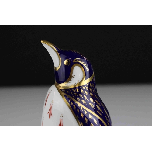 14 - Royal Crown Derby Penguin Paperweight with gold stopper.