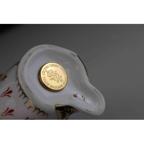 14 - Royal Crown Derby Penguin Paperweight with gold stopper.