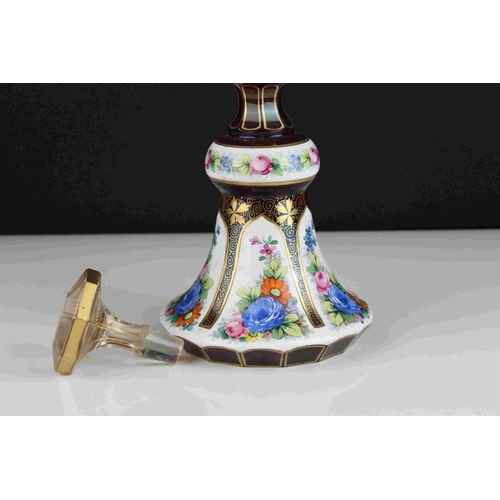 25 - 19th century Bohemian red ground Glass Decanter with gilt and painted floral panels.