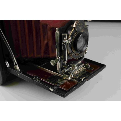 47 - Early 20th century Kodak Automatic red leather bellows camera with leather case