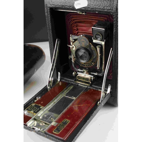 47 - Early 20th century Kodak Automatic red leather bellows camera with leather case