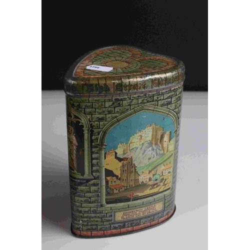 54 - Three biscuit tins to include pair of early 20th century biscuit tins in the form of marble plinths ... 