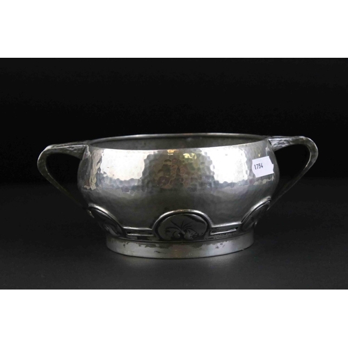 55 - Early 20th century Tudric hammered pewter bowl with stylized leaf decoration marked Tudric England 0... 