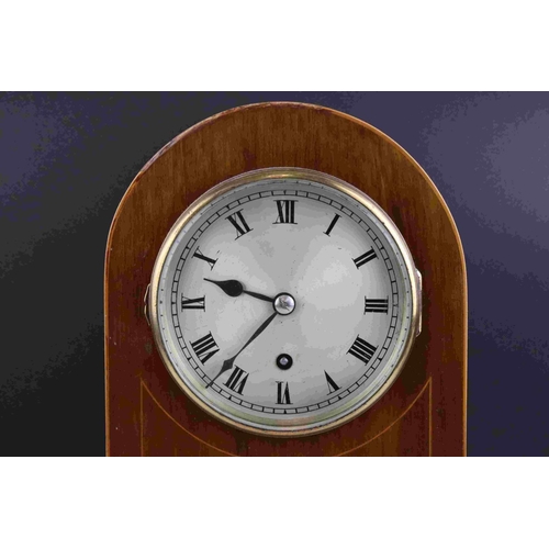 57 - Edwardian string inlaid mahogany dome topped mantle clock with single train movement.  In working or... 