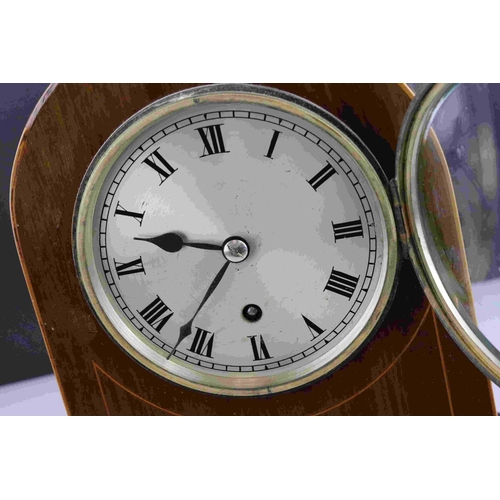 57 - Edwardian string inlaid mahogany dome topped mantle clock with single train movement.  In working or... 