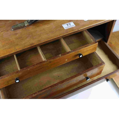 77 - A vintage wooden portable collectors cabinet with 5 internal drawers of various sizes.