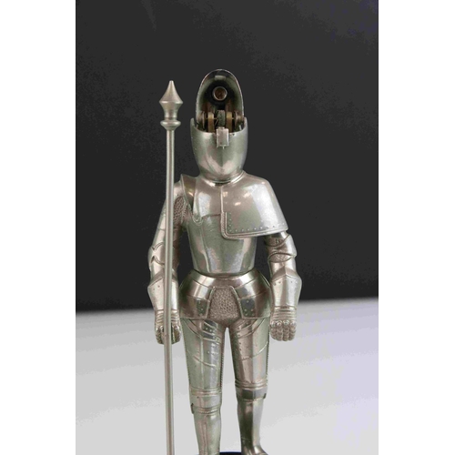 81 - A German musical table cigarette lighter in the form of a knight.