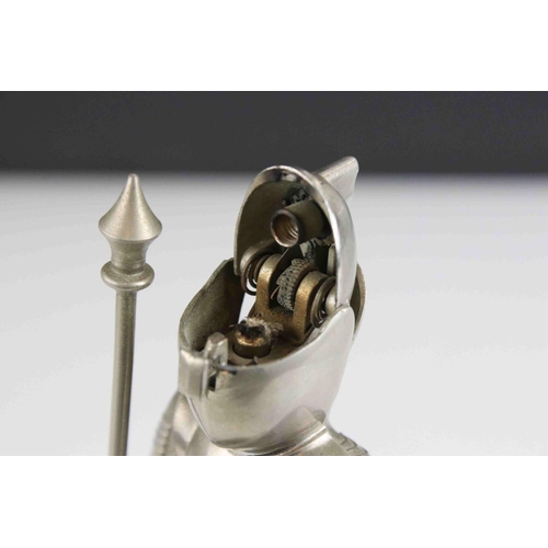 81 - A German musical table cigarette lighter in the form of a knight.