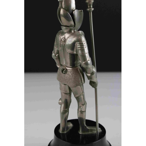 81 - A German musical table cigarette lighter in the form of a knight.