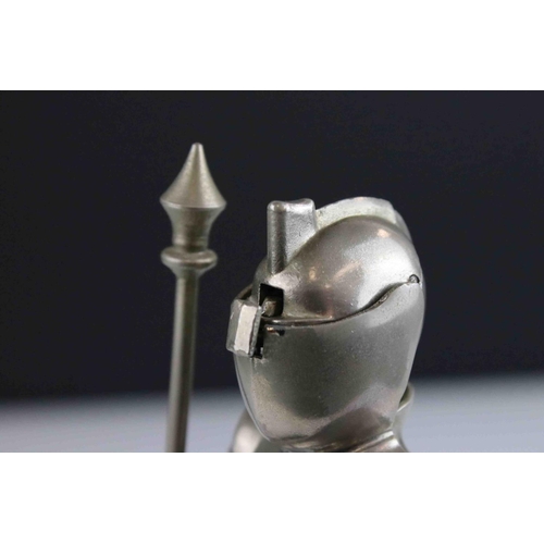 81 - A German musical table cigarette lighter in the form of a knight.