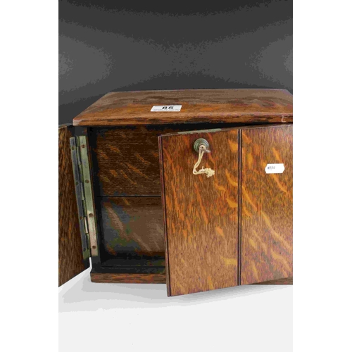 85 - A vintage lockable desktop cabinet with two internal drawers.