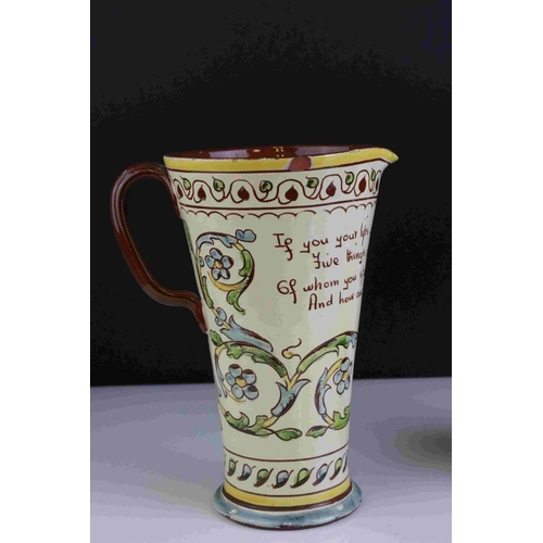 9 - Large Aller Valley motto ware Jug, 25cms high together with a similar Torquay Pottery tobacco jar.