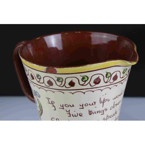 9 - Large Aller Valley motto ware Jug, 25cms high together with a similar Torquay Pottery tobacco jar.