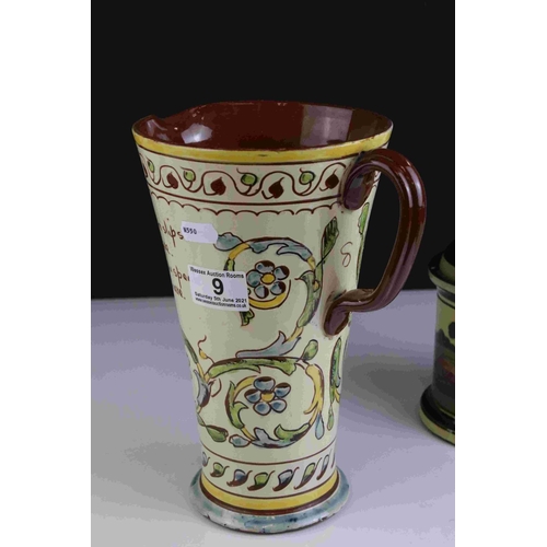 9 - Large Aller Valley motto ware Jug, 25cms high together with a similar Torquay Pottery tobacco jar.