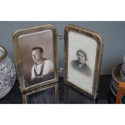 367 - A box of mixed collectables to include two bottle coasters, a folding double photograph frame and a ... 