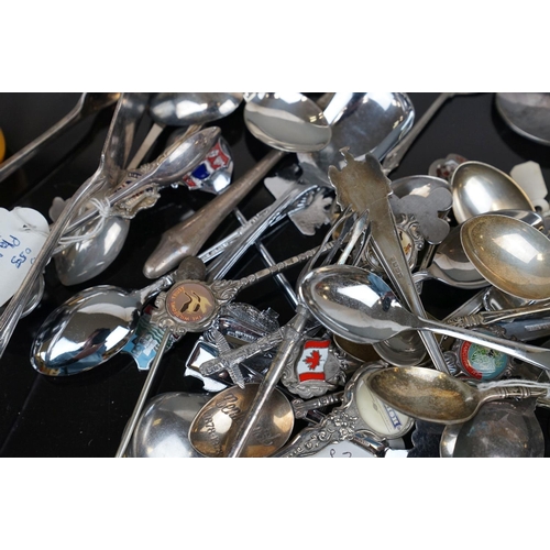 373 - A collection of silver plated crested spoons together with other silver plated cutlery to include a ... 