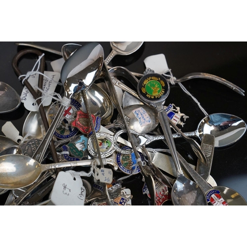 373 - A collection of silver plated crested spoons together with other silver plated cutlery to include a ... 