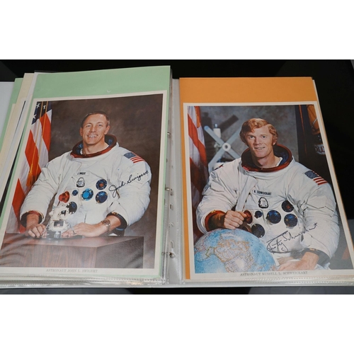 395 - A collection of space flight ephemera to include first day covers and signed photographs.