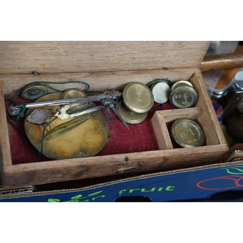 400 - A box of mixed collectables to include a pipe rack in the form of a gate, boxed vintage scales & wei... 