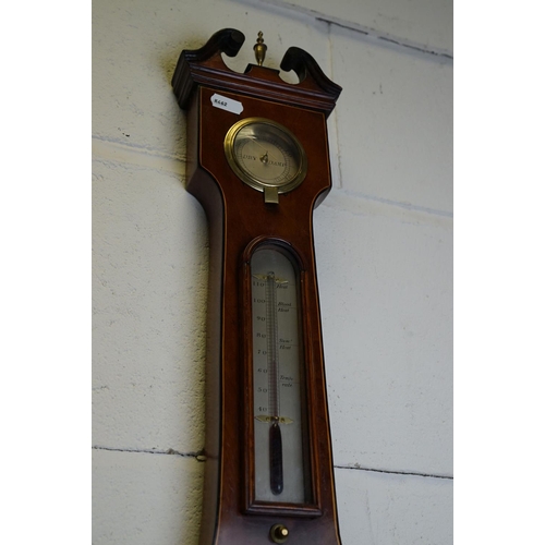 401 - An antique mahogany cased L Martinelli of London banjo Barometer.