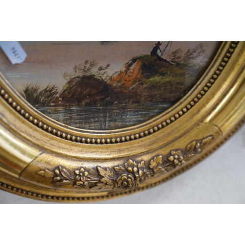 410 - An early 20th century oval gilt framed watercolour, mountain lake scene with fishermen and a steam p... 