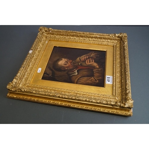 415 - A 19th century oil on panel, Continental portrait of a man playing a flute, mounted in an ornate gil... 