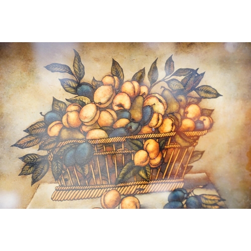 418 - A framed and glazed painting on glass, still life fruit in a basket.