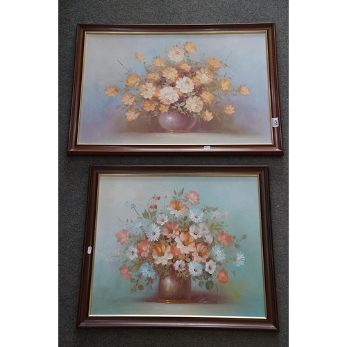 436 - Two framed oil on canvas still life flower paintings.