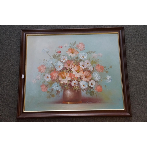 436 - Two framed oil on canvas still life flower paintings.